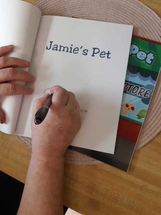 Author Ramona Morrow Autographing Jamie's Pet Children's Book 