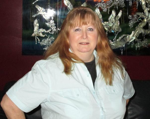 Blonde Hair Blue Eye Woman Standing Smiling Author Picture